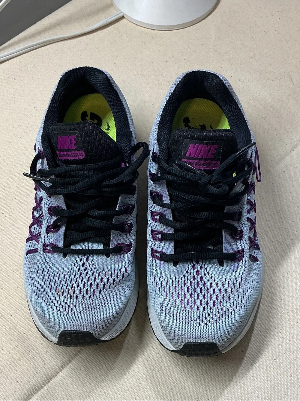 Nike Women's running Shoes in Light Blue with Purple Accents